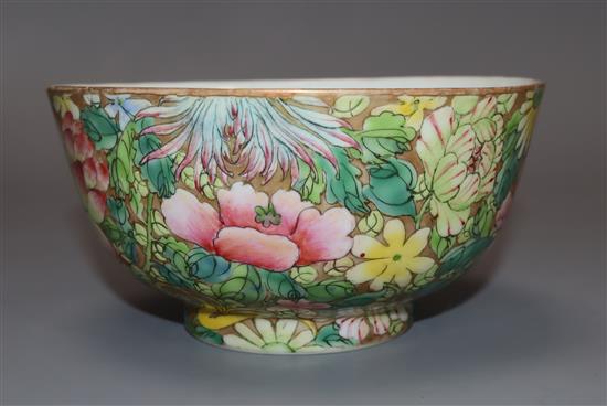 A Chinese famille rose Thousand Flower bowl, Qianlong mark, early 20th century